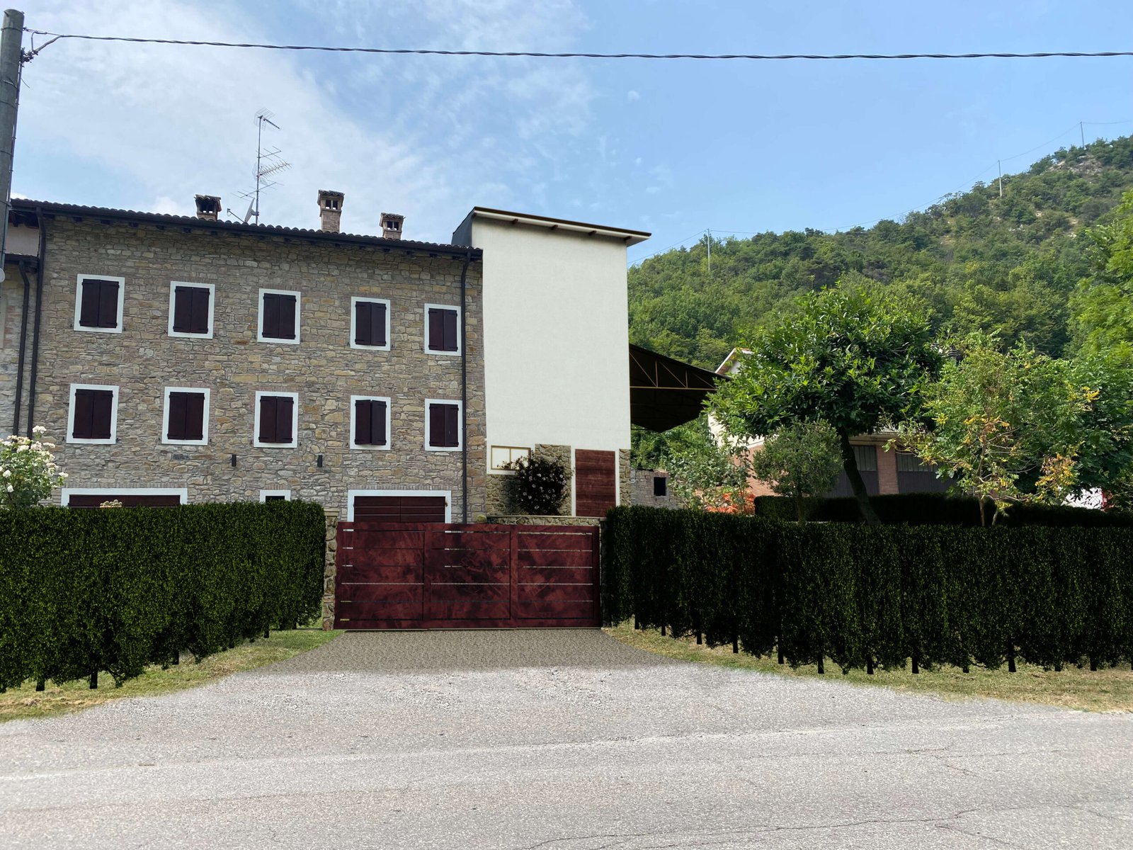 Fotoinserimento architettonico del rustico riqualificato inserito nel paesaggio rurale